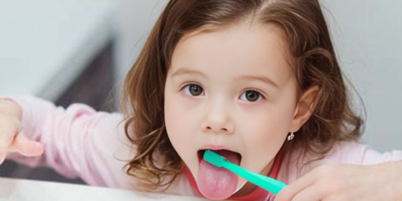 Kid Brushing Tongue image