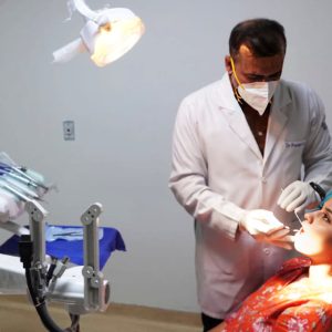 Dr. Praveen Kumar With patient Image